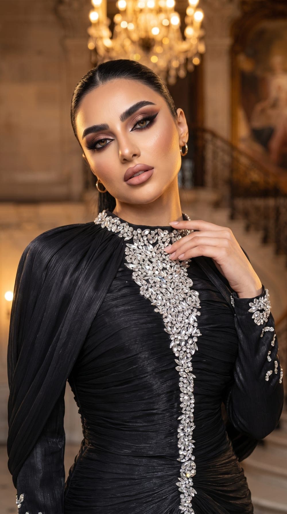 Woman_posing_in_beaded_dress_202608091037